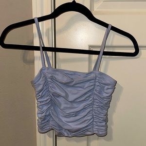 It is a Hollister crop top in the color baby blue